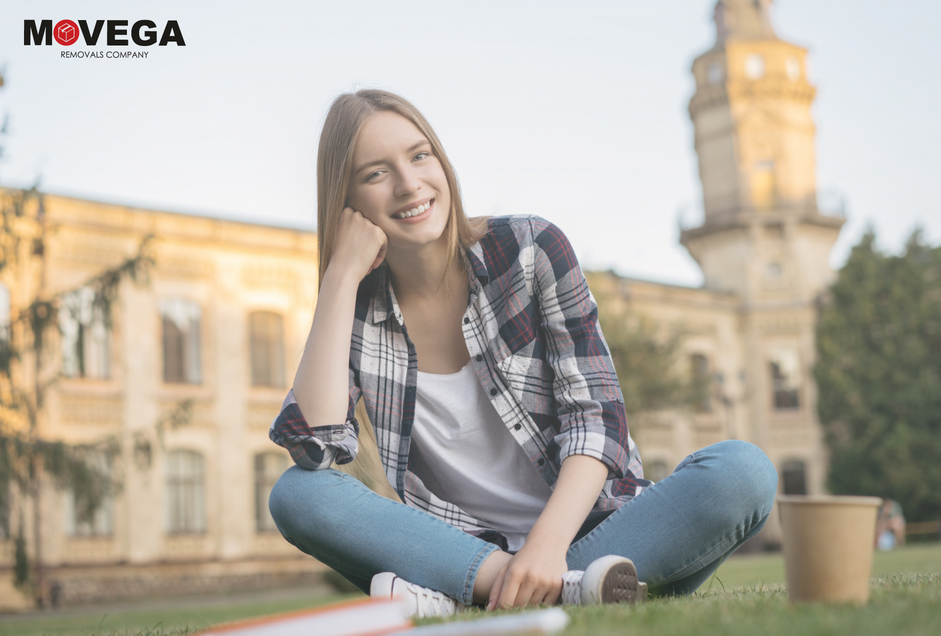 a young woman posing for a photo in a European city where she studies